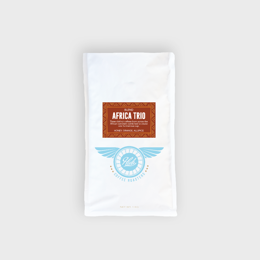 White coffee bag with 'Africa Trio' label on a white background